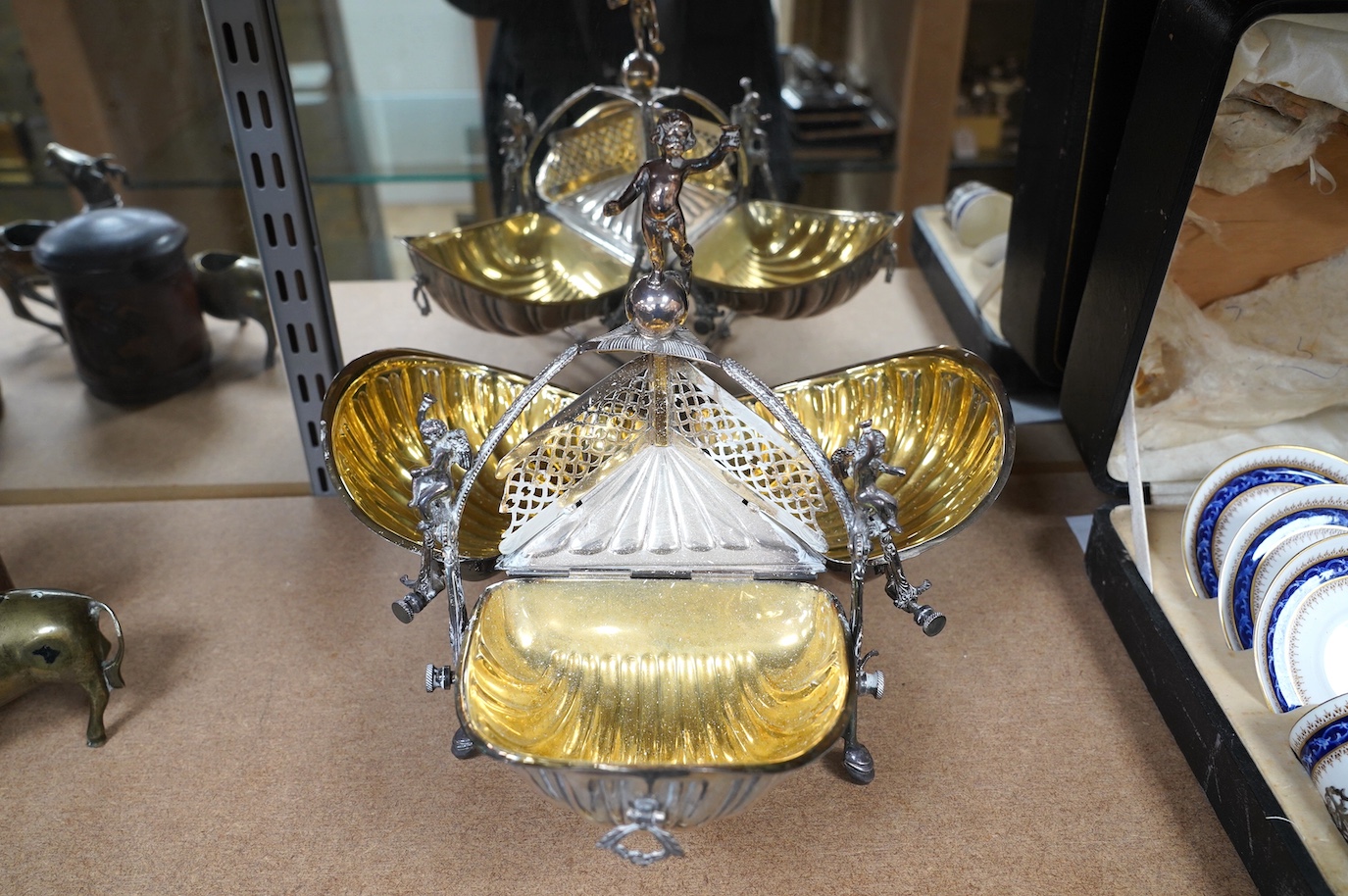 A late Victorian plated Staniforth patent triple scallop biscuit box with gilded interior, 29cm high. Condition - good